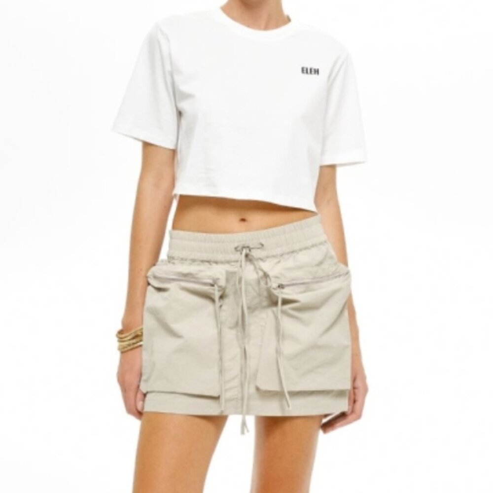 NWT. ELEH MINI SKIRT WITH POCKETS - BEIGE